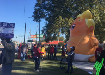 Trump’s visit to Alabama game sparks protests