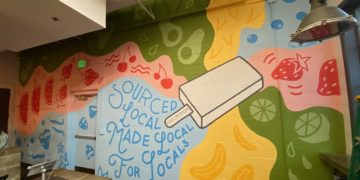 Senior art student paints mural