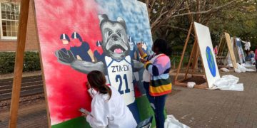 Samford student organizations decorate Homecoming boards in Ben Brown Plaza