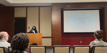 Professor Niya Pickett Miller speaks at event