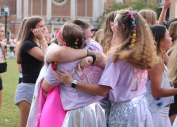 A Tri Delta member embraces her new sorority sister.