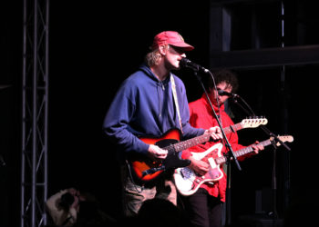 Baxter performs a song for the crowd.