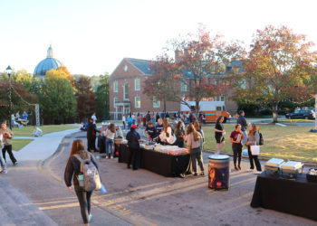 Students visit tables on Tailbird Circle for Fall Fest.