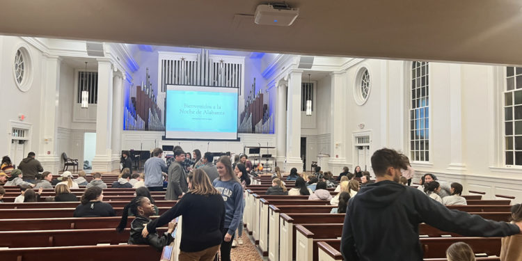 Attendees congregate in Reid Chapel for Spanish Worship Night.
