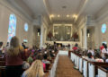 Visitors worshipping in Reid Chapel.