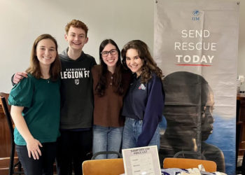 IJM members raise advocacy awareness at the event.