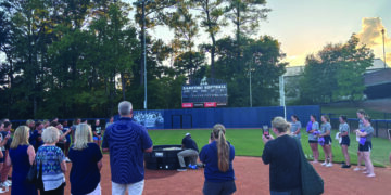 Playing for Christ: Softball team Bible study leads to baptisms  