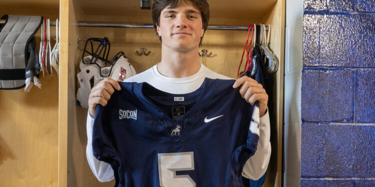Ryan Oliver wears Charles Williams Memorial Jersey